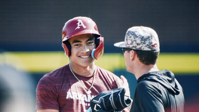 Wehiva Aloy talks to Bobby Wernes during a fall scrimmage